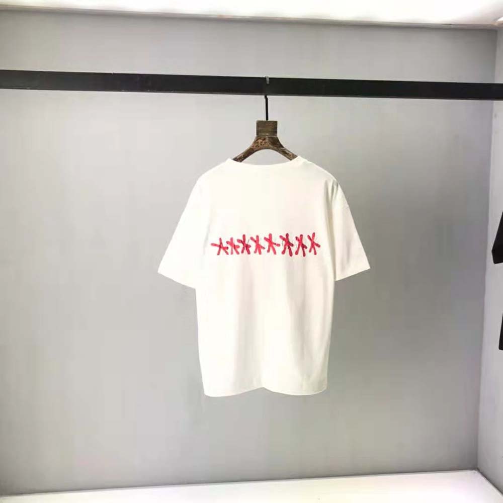 Side angle showing slim fit silhouette of Givenchy white jersey T-shirt