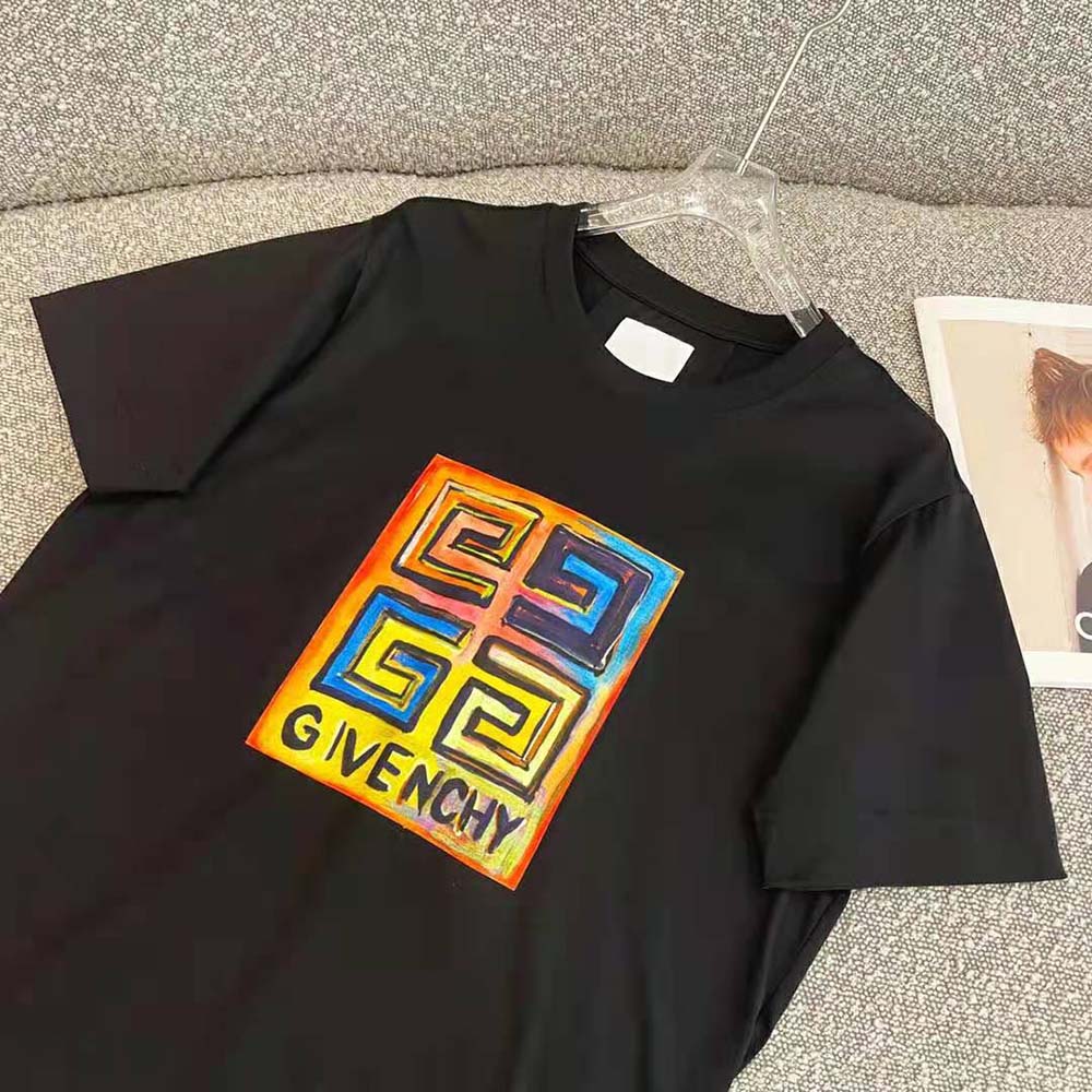 Side angle showing slim fit silhouette of Givenchy Men 4G Sun Print T-shirt