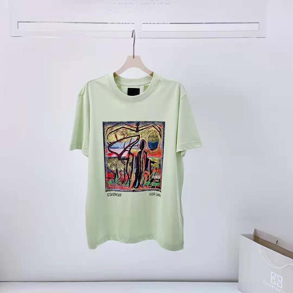 Close-up of embroidered Reaper patch on lime Givenchy slim fit T-shirt