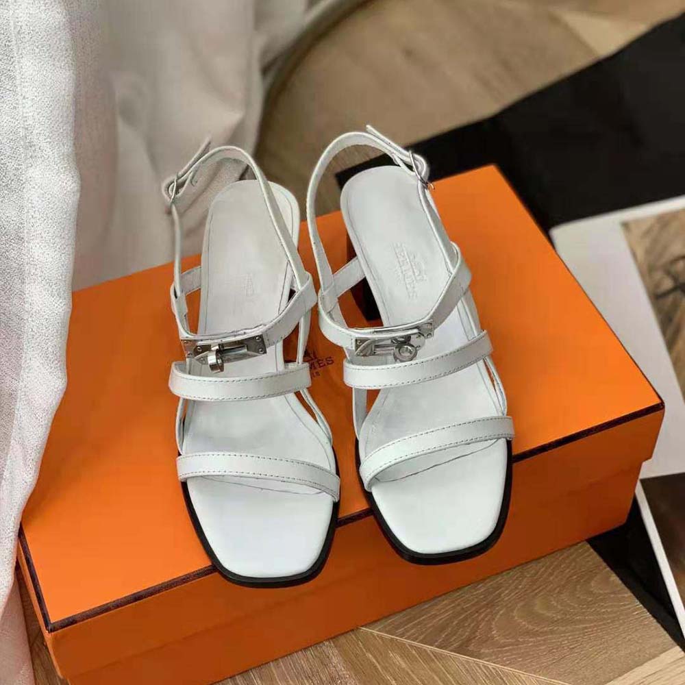 Close-up of the curved strap detail on Hermes Women Eve 60 Sandal