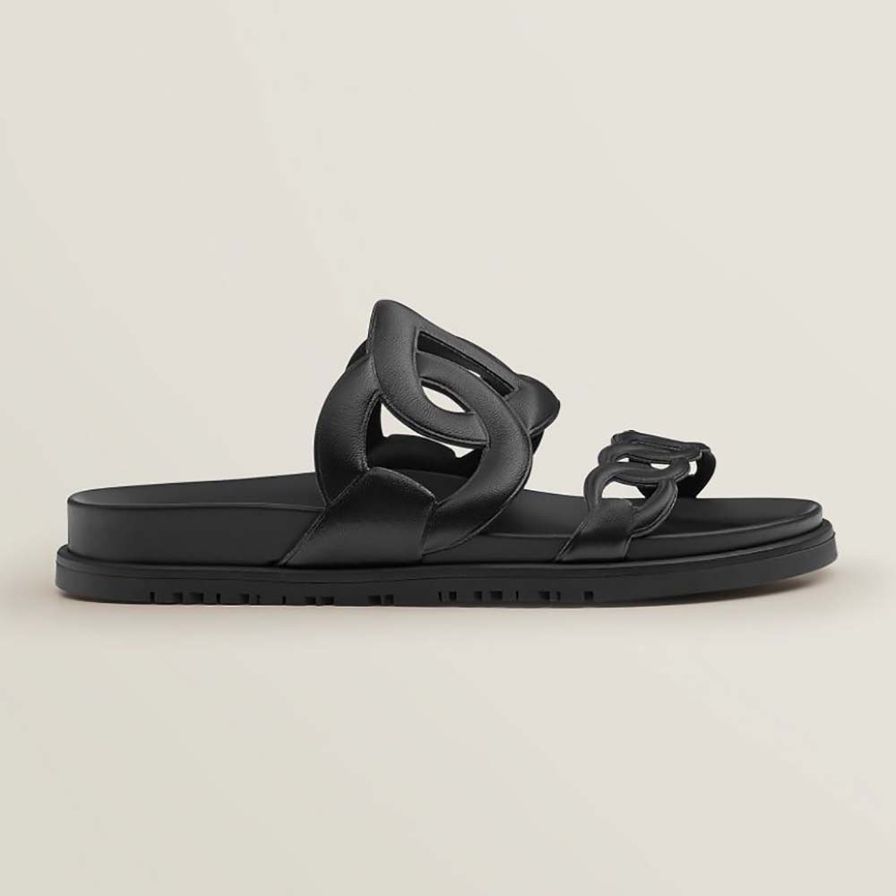 Side view of Hermes Women Extra Sandal in Nappa Leather-Black on white background