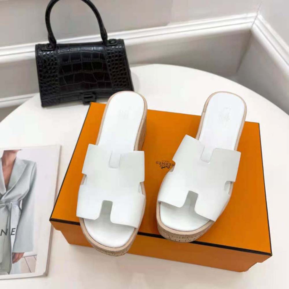 Close-up of signature ‘H’ cutout on Hermes Women Eze 30 Sandal