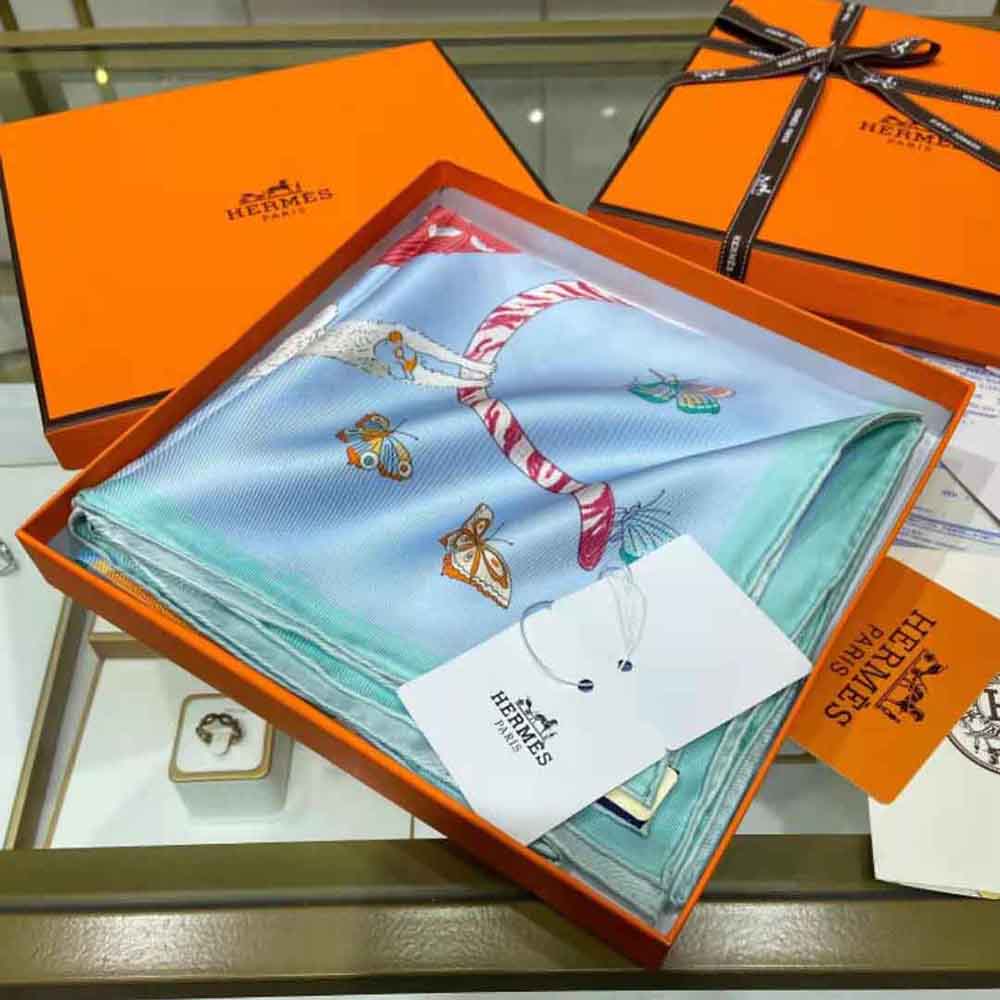Close-up of hand-rolled edges on Hermes Women Hermes Story Scarf 90 Blue