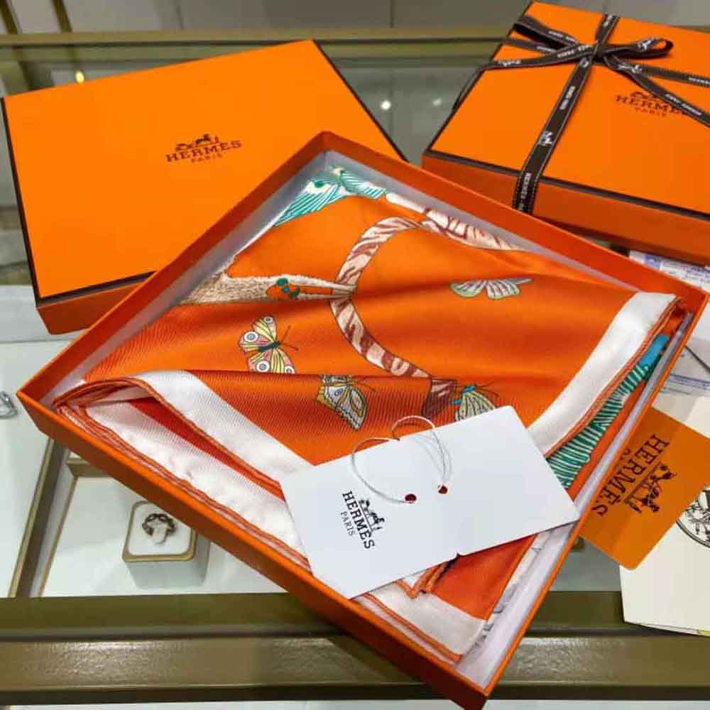 Hermes Women Hermes Story Scarf 90 silk twill texture detail in vibrant orange