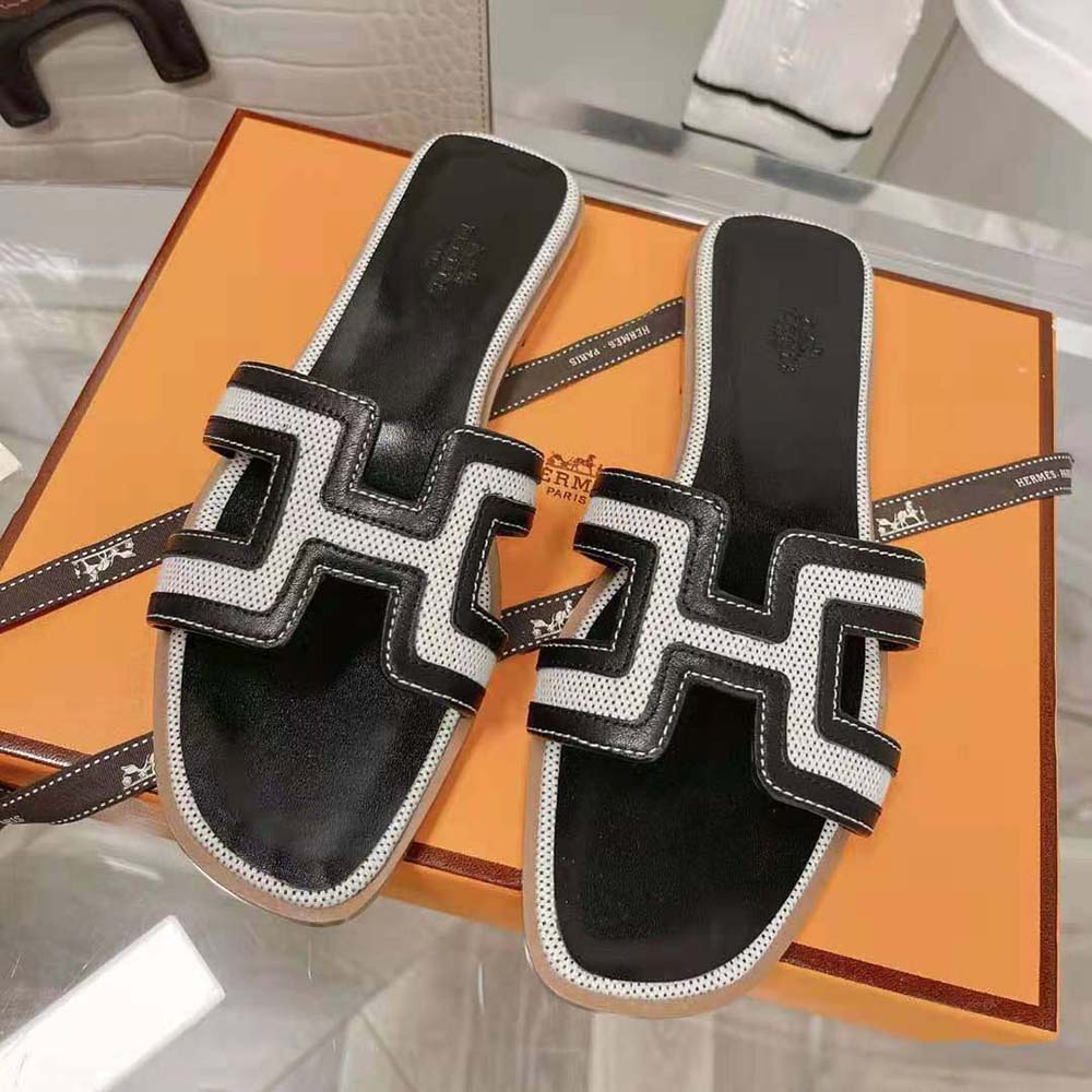 Close-up of the iconic H cut-out on Hermes Women Oran Sandal