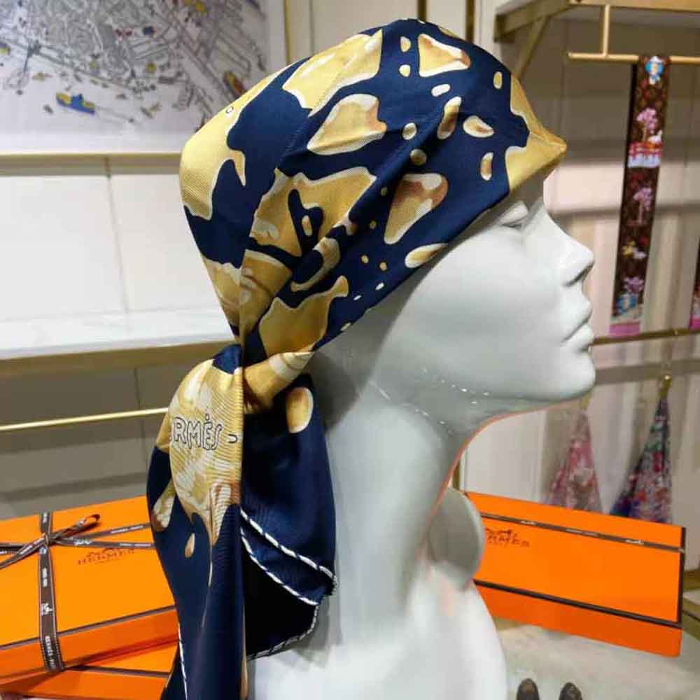 Detail of vibrant navy print on Hermes Women Peinture Fraiche Scarf 45