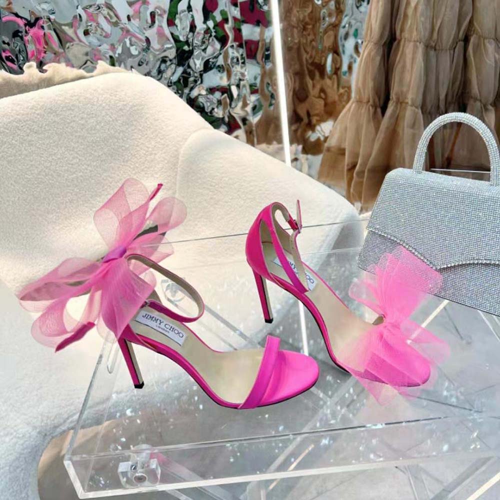 Side profile showing sleek 100mm heel and buckle closure