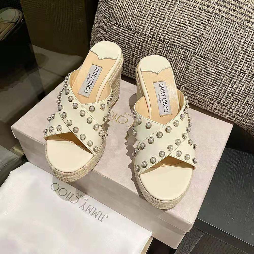 Close-up of pearl embellishments on Jimmy Choo Dovina 100 wedges upper