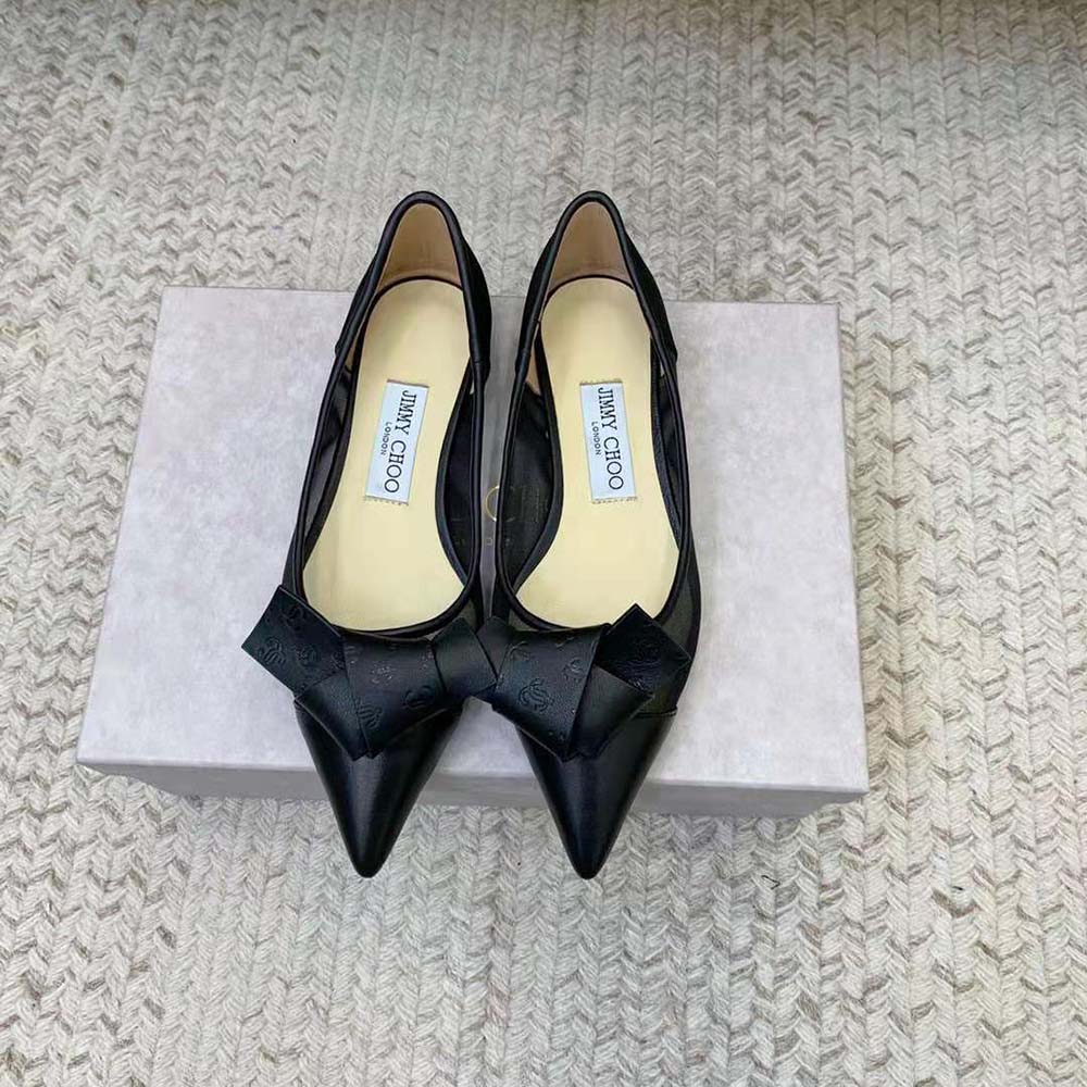 Close-up of JC monogram leather bow detail on Jimmy Choo Lani Flats