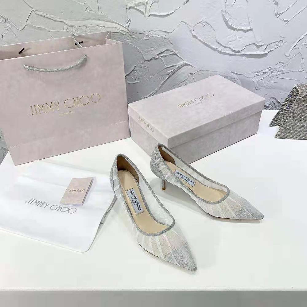 Close-up of glitter fabric and stiletto heel on Jimmy Choo Love 65 pumps