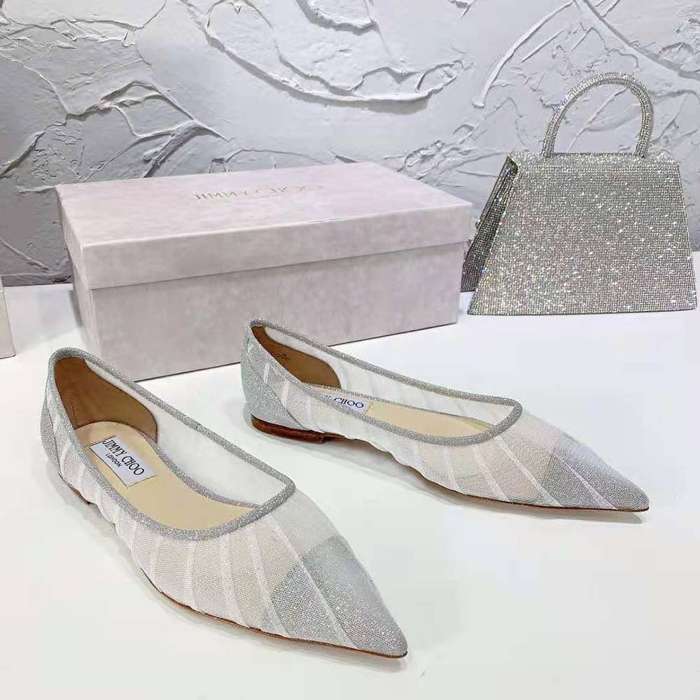 Back heel detail featuring Jimmy Choo logo on metallic silver flats