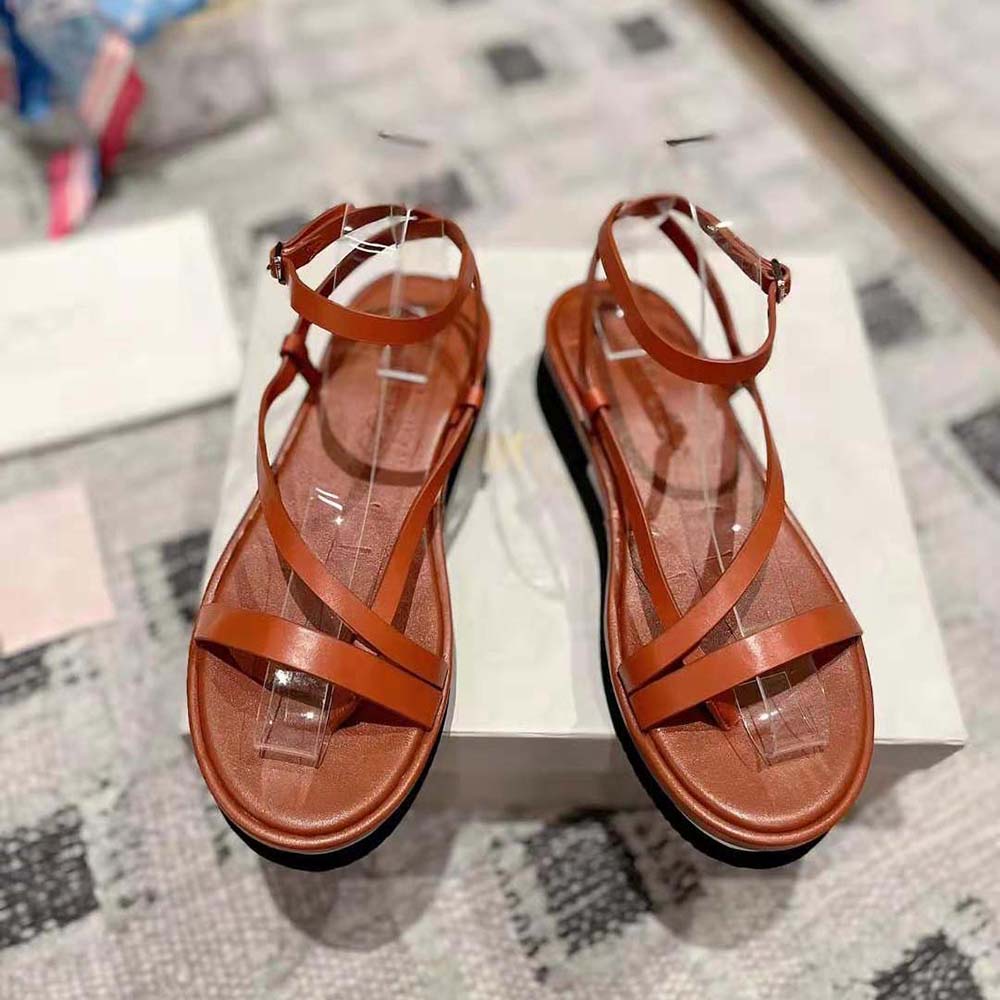 Close-up detail of buckle on Jimmy Choo Women Pine Flat Sandals