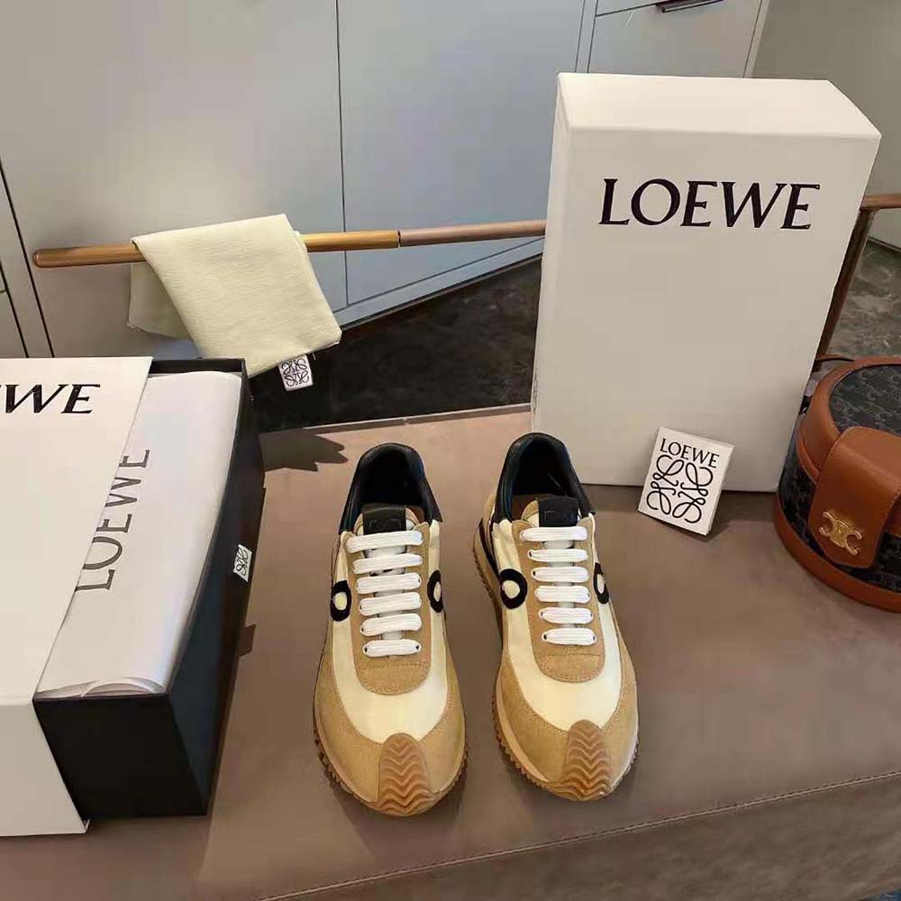 Close-up of rich brown suede and lace details on Loewe Women Flow Runner