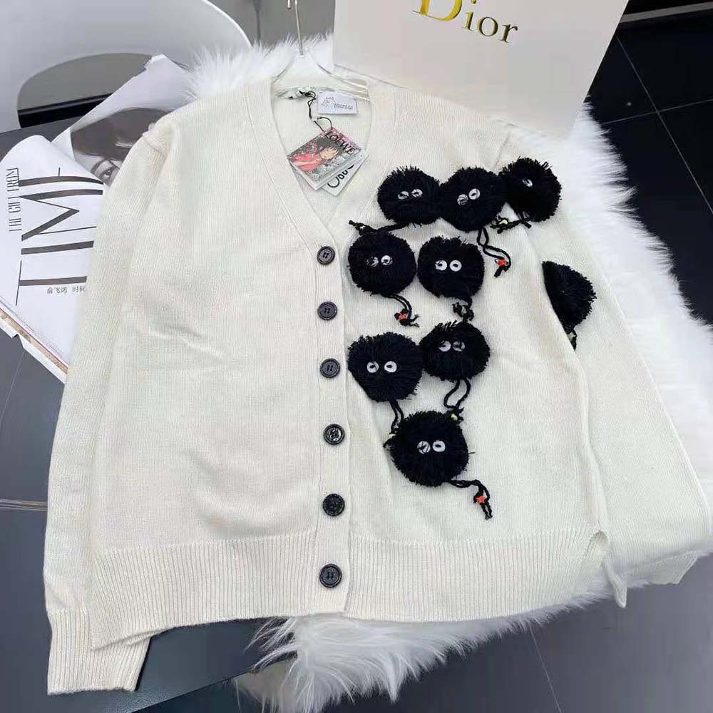 Close-up of hand-knitted detail on Loewe Women Susuwatari Cardigan in White