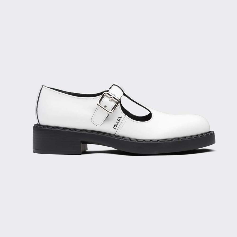 Side view of Prada Women Brushed-Leather Mary Jane T-Strap Shoes-White