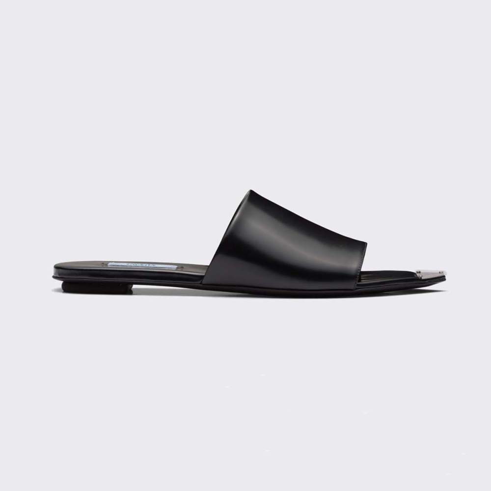 Side angle of Prada Women Brushed Leather Slides in black