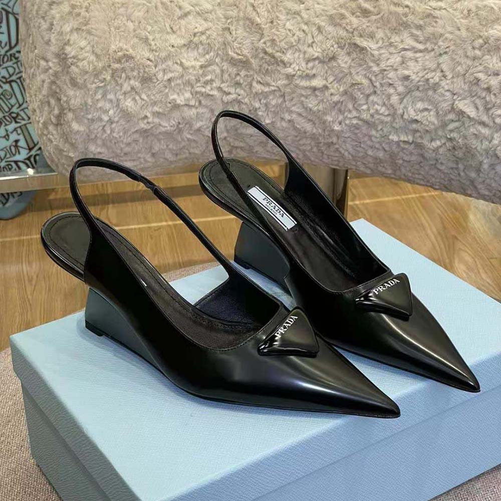 Close-up of brushed leather texture and slingback strap on Prada pumps
