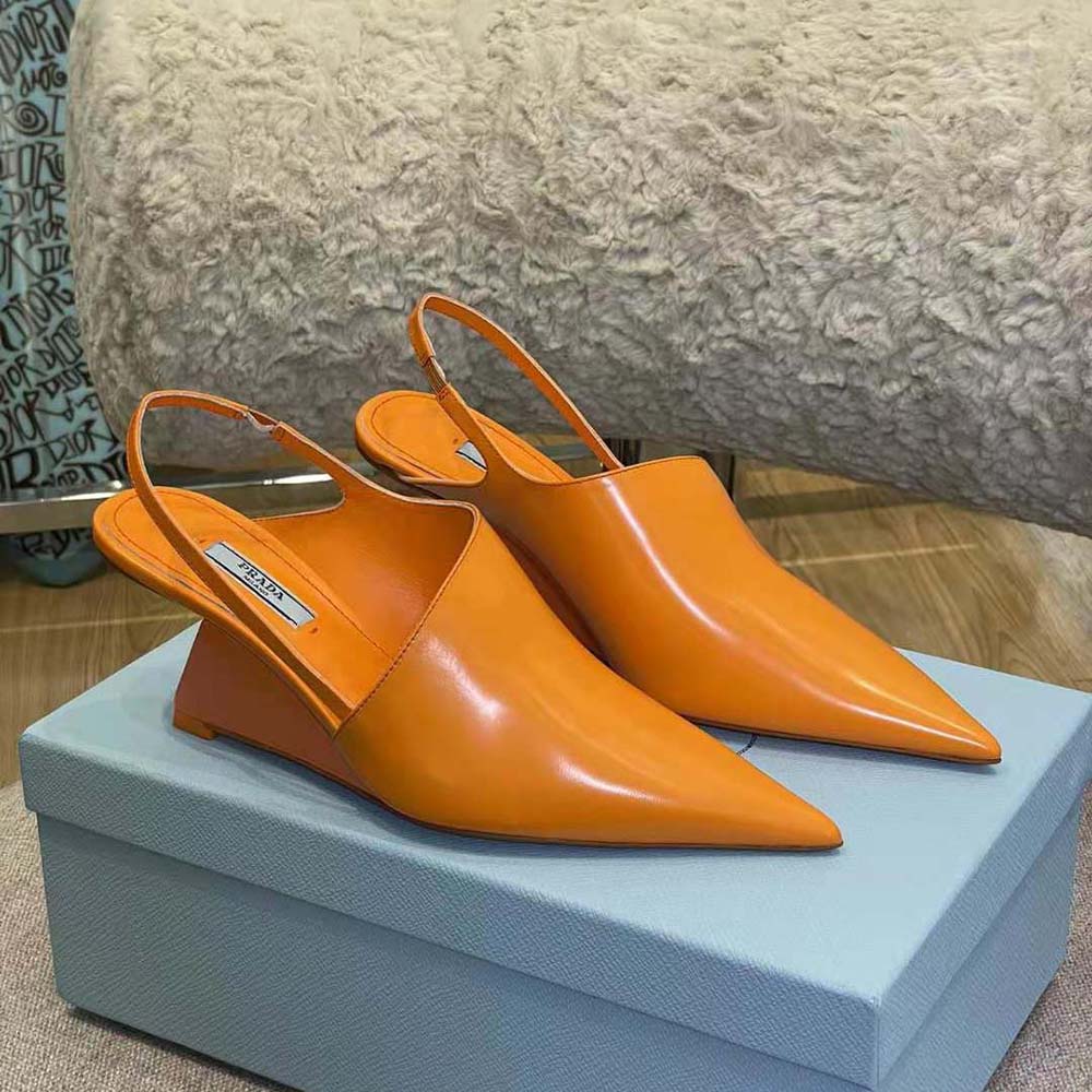 Close-up of 65mm heel and brushed leather detail on Prada slingbacks