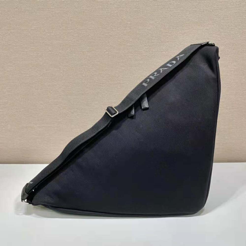 Side angle of Prada Women Canvas Prada Triangle Bag-Black with zip closure
