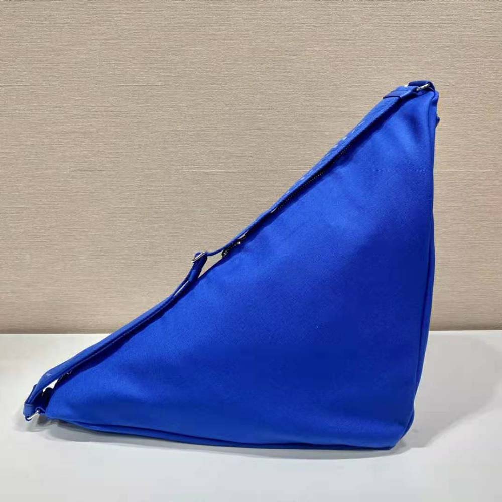 Side profile showing zipper closure of Prada Women Canvas Prada Triangle Bag-Navy