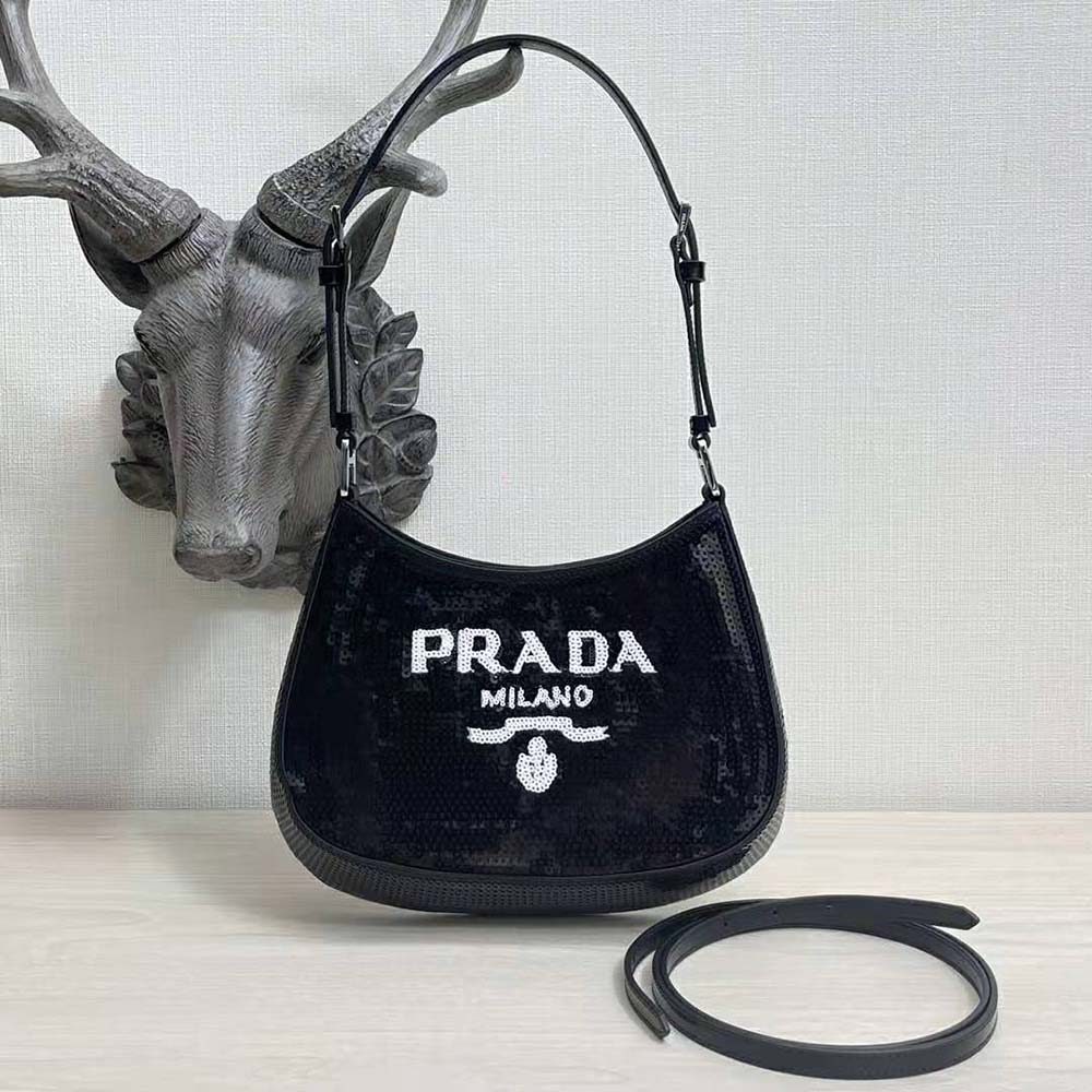 Close-up on black sequined fabric and silver hardware on Prada Women Cleo Bag