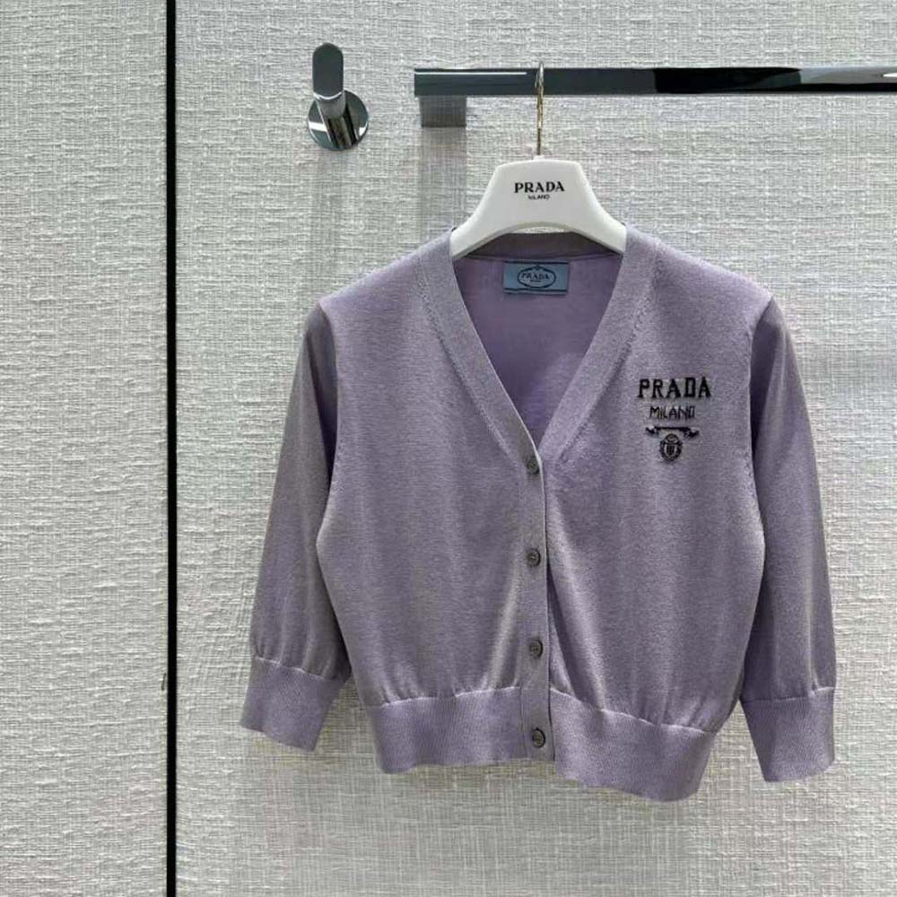 Close-up of intarsia logo detail on Prada Women Cropped Lurex Cardigan