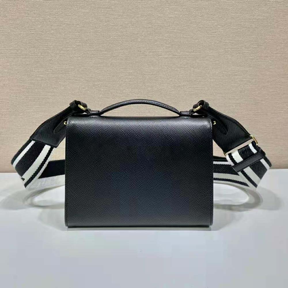 Side angle showing strap detail of Prada Women Monochrome Saffiano and Leather Bag-Black