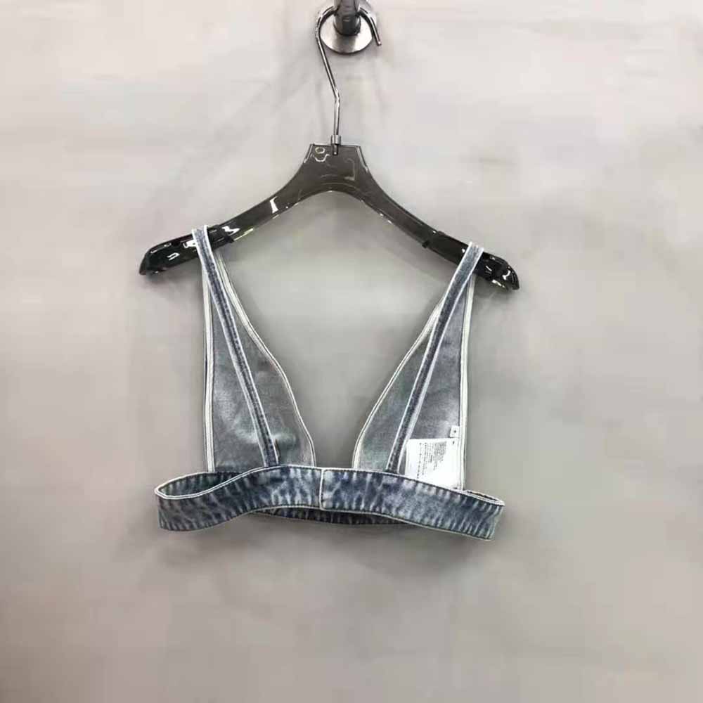 Side angle highlighting washed denim texture on Prada Women Organic Denim Top