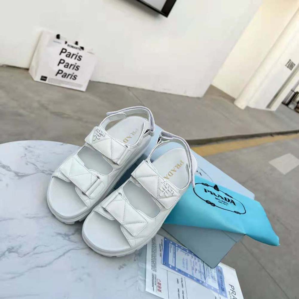 Close-up of padded white nappa leather on Prada sandals