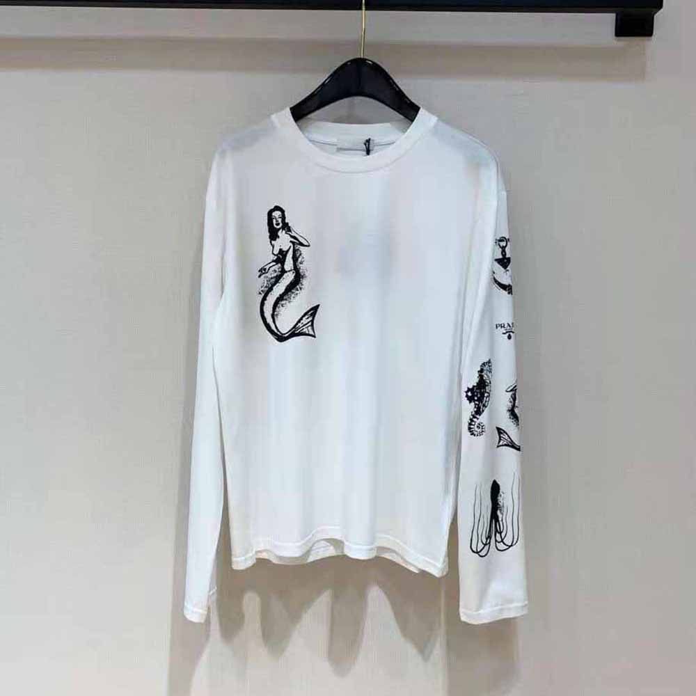 Close-up of bold Prada logo print on white cotton T-shirt