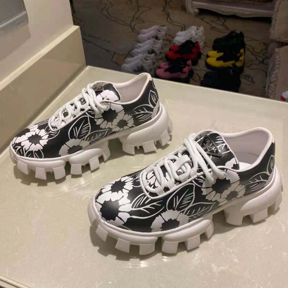 Overhead view of lace-up and rubber sole on Prada Women Printed Nylon Sneakers-Black