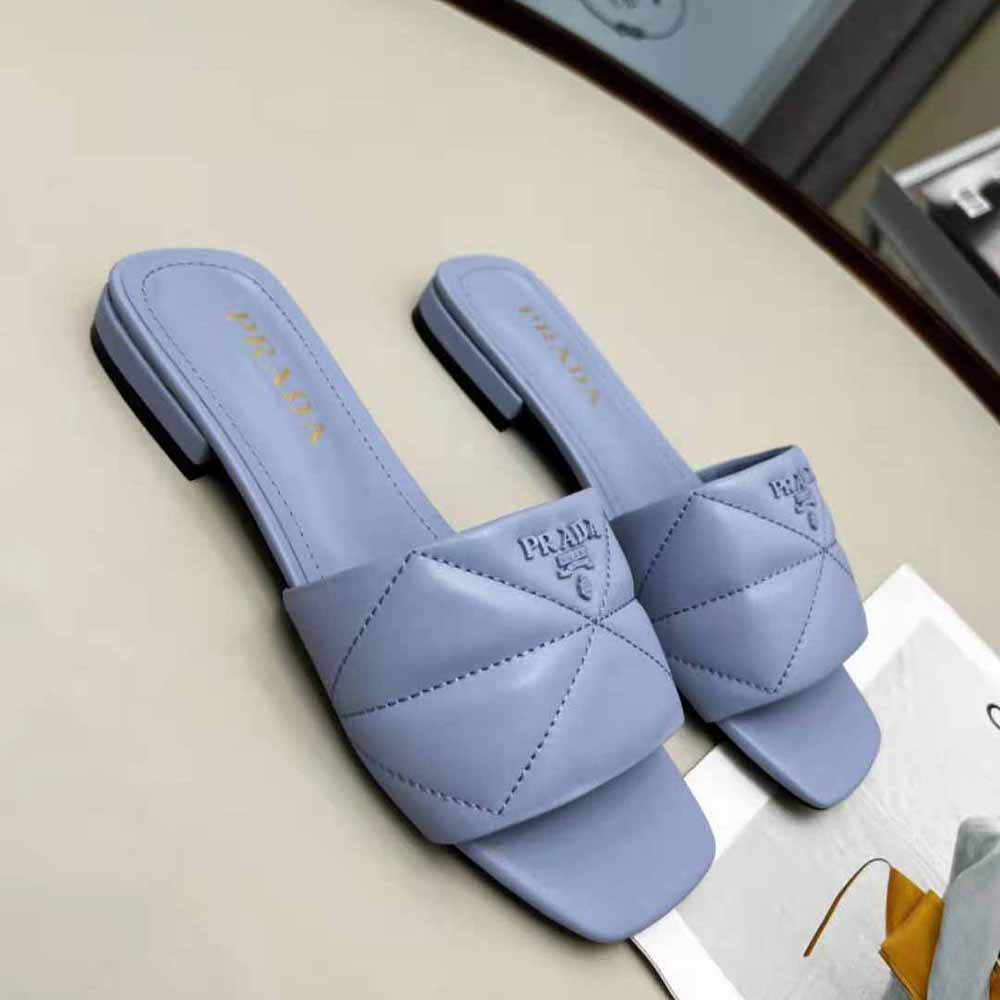 Close-up of sole and leather texture on Prada Women Quilted Nappa Leather Sabots-Blue
