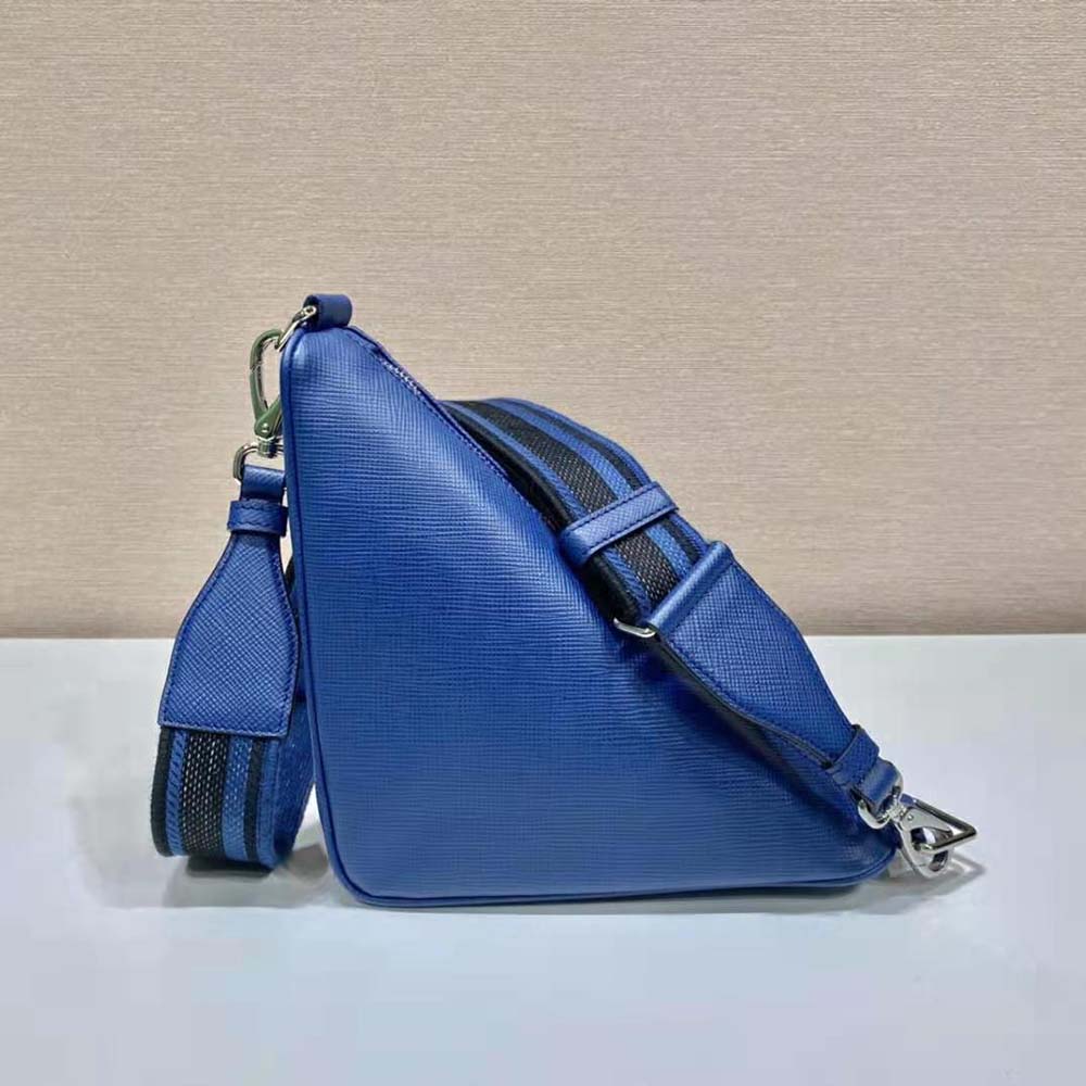 Side profile showing zip closure and strap of Prada Triangle Bag-Navy