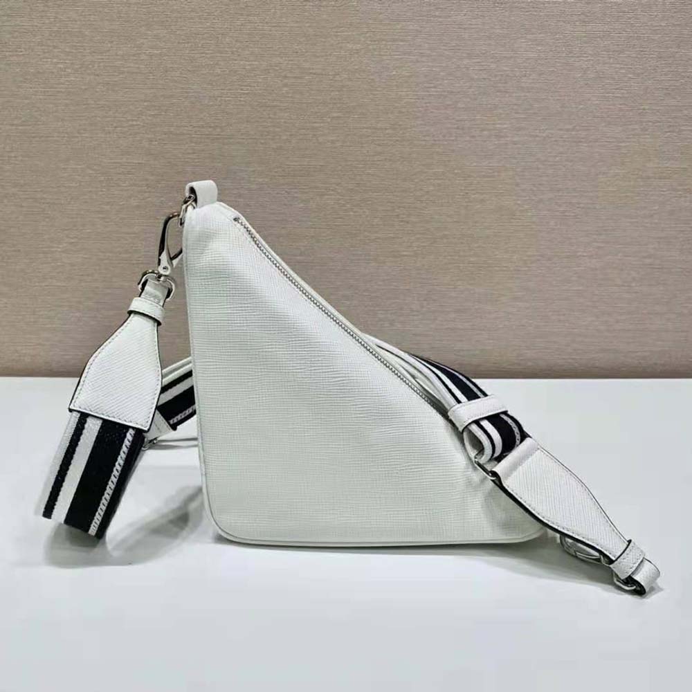 Side angle of Prada Women Saffiano Prada Triangle Bag-White with adjustable strap visible