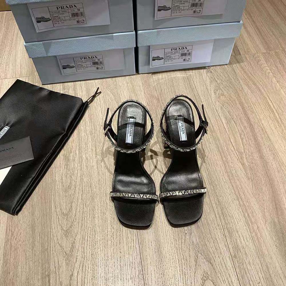 Top angle showing luxurious black satin and heel of Prada Women Satin Sandals