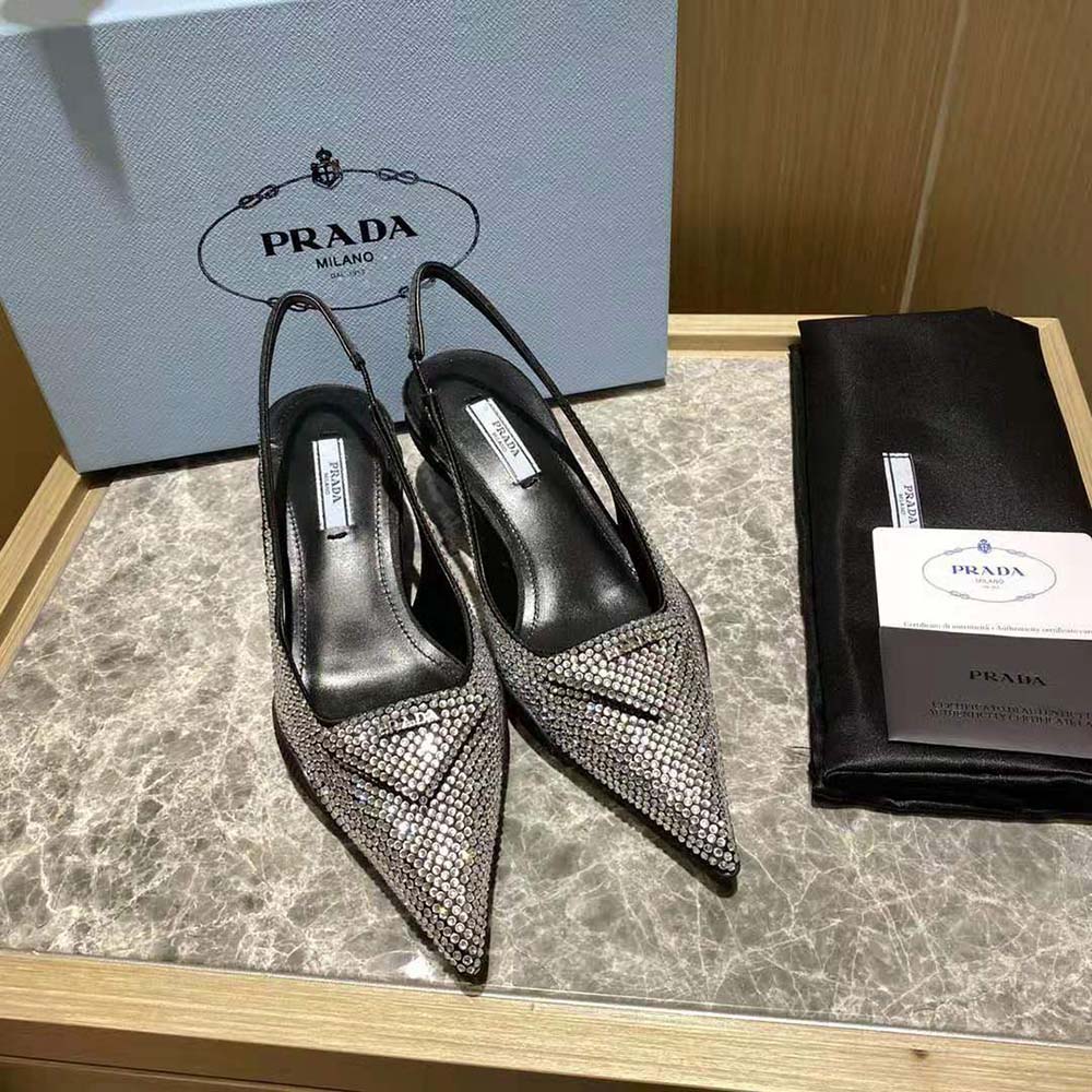 Close-up of crystal embellishments on Prada Women Satin Sling-Back Pumps