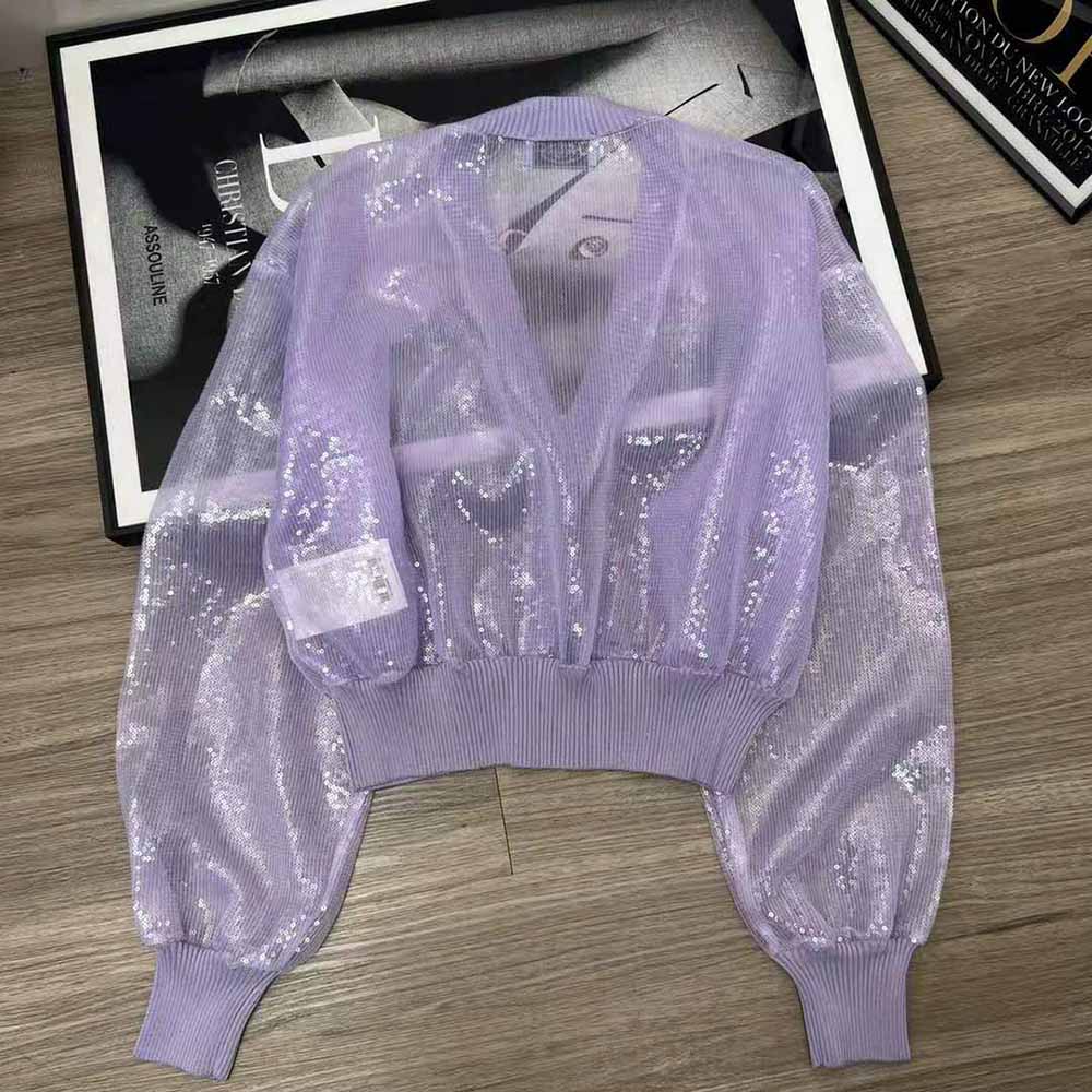 Side profile showing silhouette of Prada Women Sequin-Embroidered Tulle Crop Top-Purple