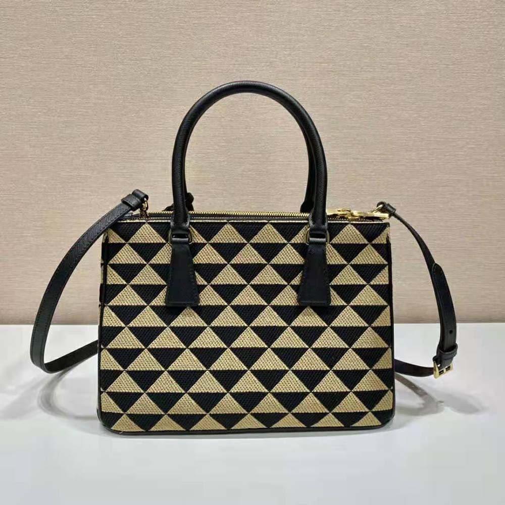 Side angle showing silhouette and leather trim of Prada Small Galleria bag