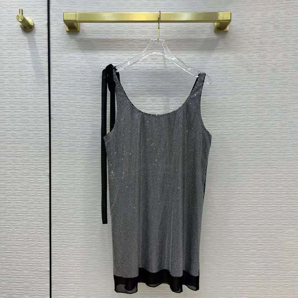 Side angle showing movement in Prada Women Studded Chiffon Dress fabric