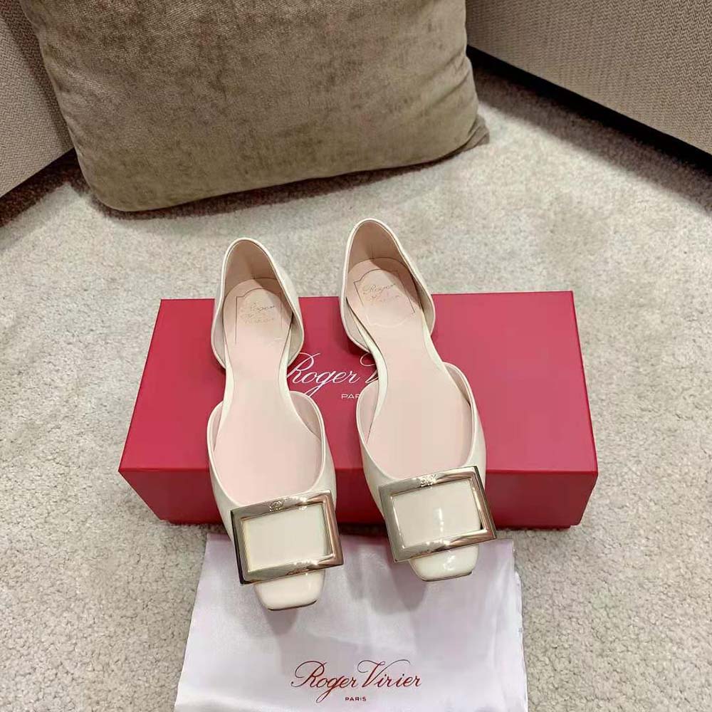 Close-up of signature metal buckle on Roger Vivier Women Trompette Dorsay Ballerinas
