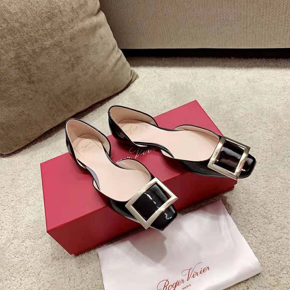 Top view showing glossy patent leather and D’Orsay silhouette of Roger Vivier ballerinas