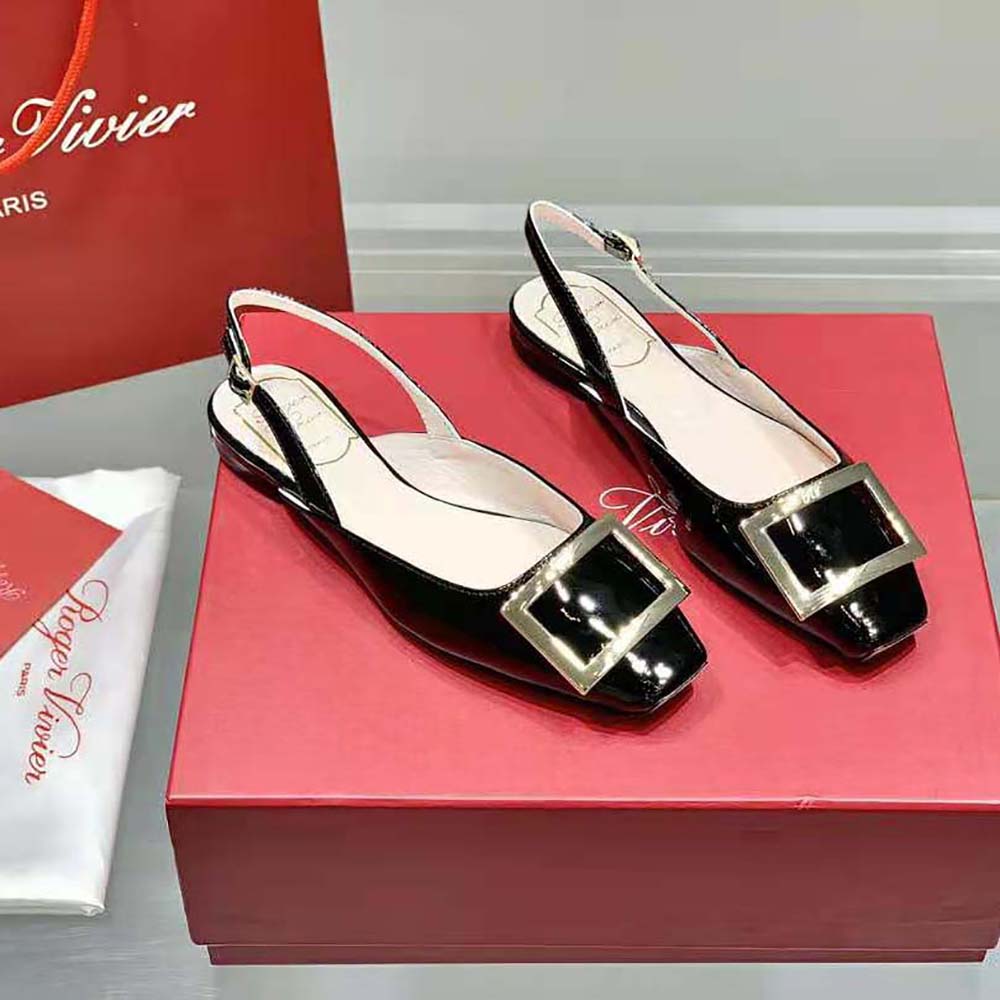 Close-up of metal buckle detail on Roger Vivier Trompette slingbacks