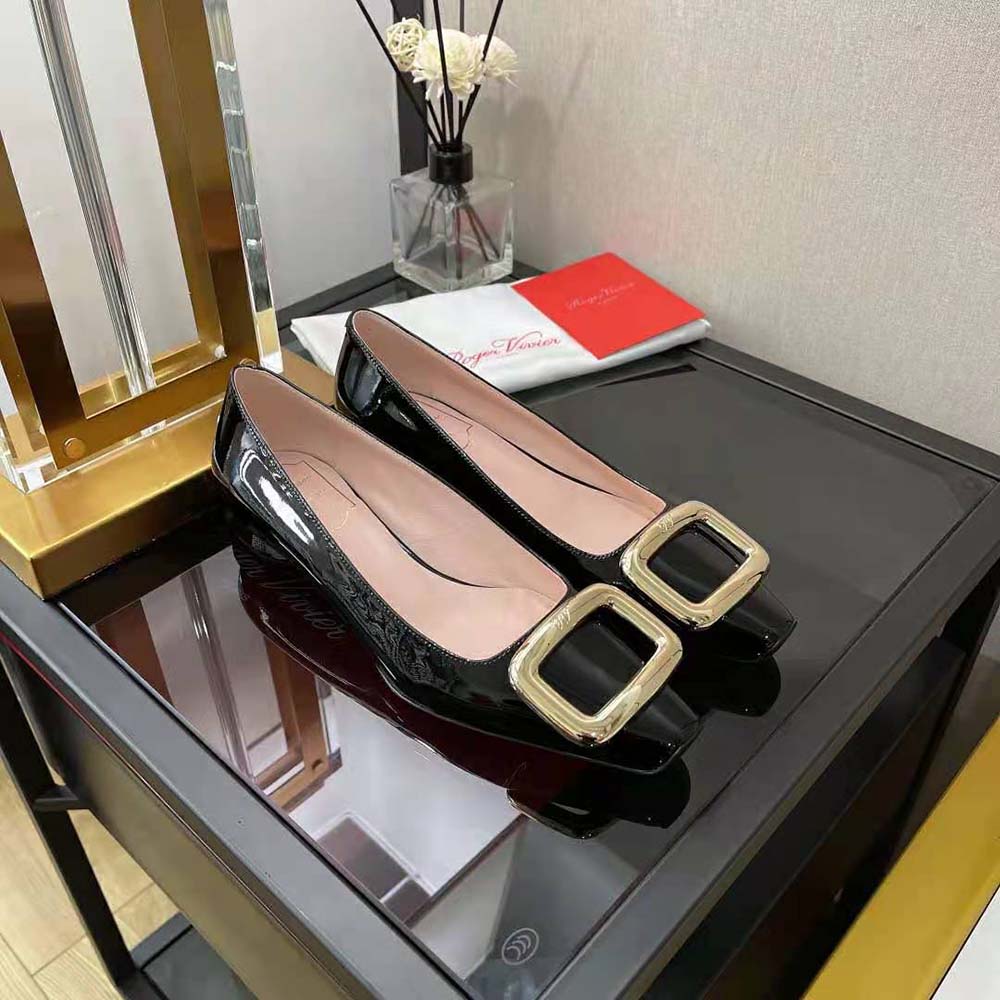 Side profile showing sleek silhouette of Roger Vivier Women Viv Choc Metal Buckle Ballerinas