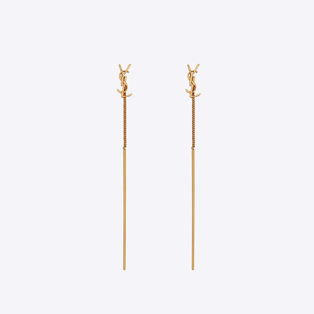Close-up of Saint Laurent YSL Women Opyum YSL Threader Earrings gold detail