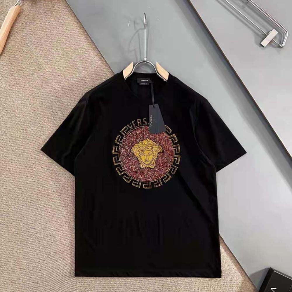 Side angle showing silhouette of Versace Women Embellished Medusa T-shirt
