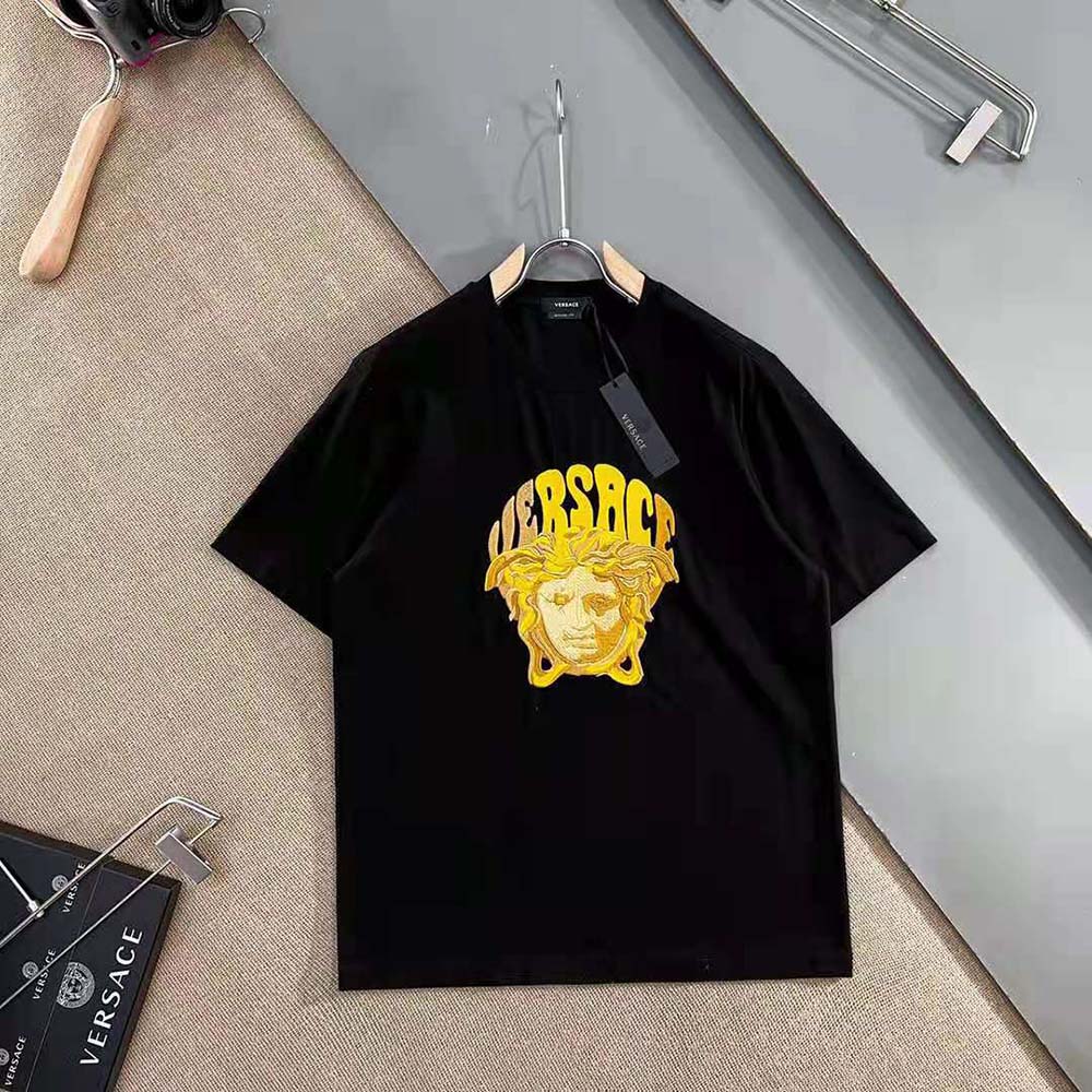 Side angle showing relaxed fit of Versace Women Medusa Music T-Shirt