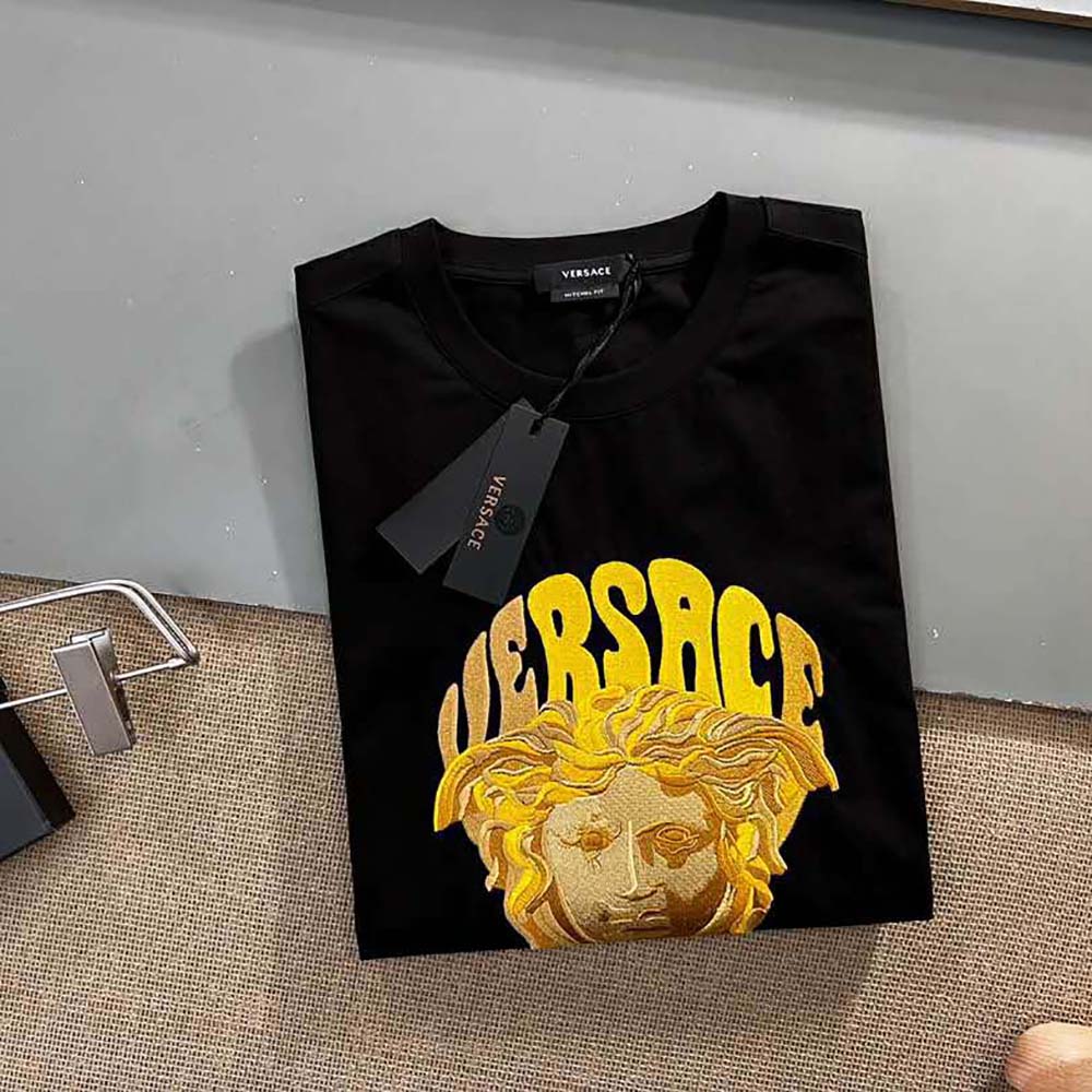 Close-up of Medusa emblem detail on Versace Women Medusa Music T-Shirt