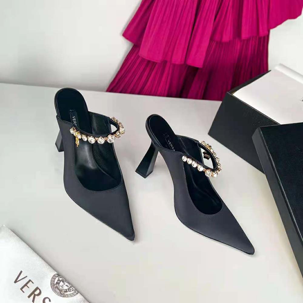 Rear view showing stiletto heel of Versace Women Artifact Mules in Black