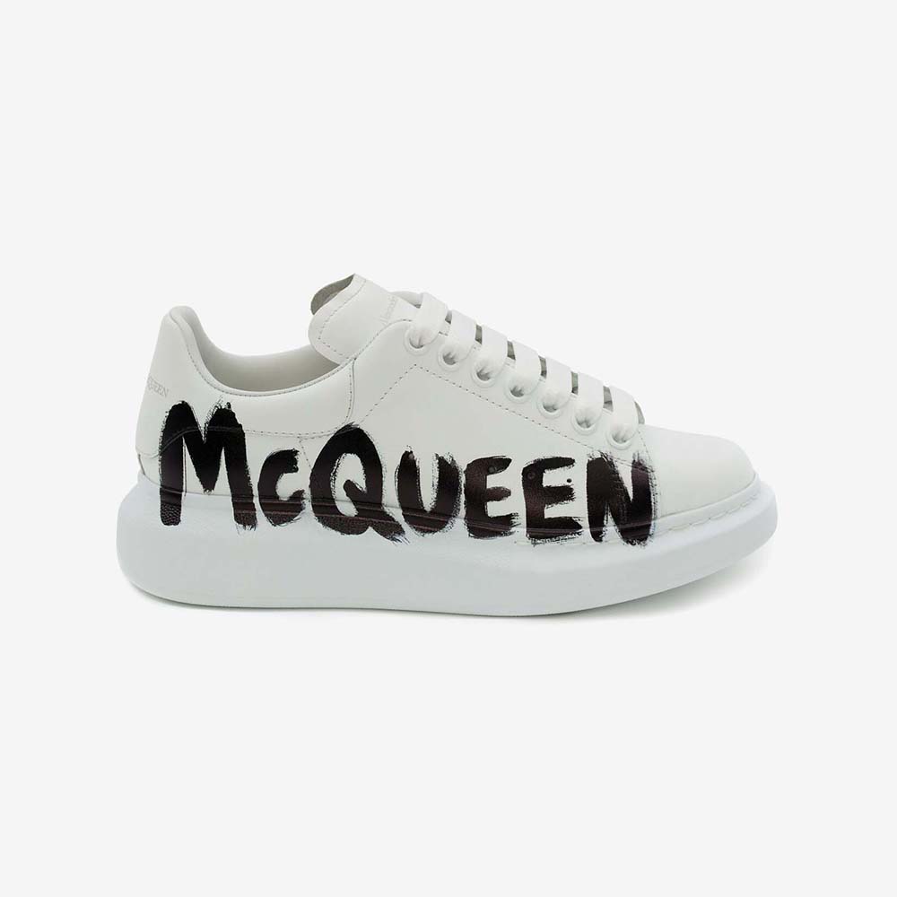 Side view of Alexander Mcqueen Unisex Online Exclusive Mcqueen Graffiti Oversized Sneaker in White/black