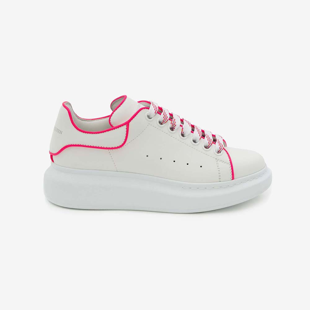 Side view of Alexander Mcqueen Women Oversized Sneaker in Neon Pink